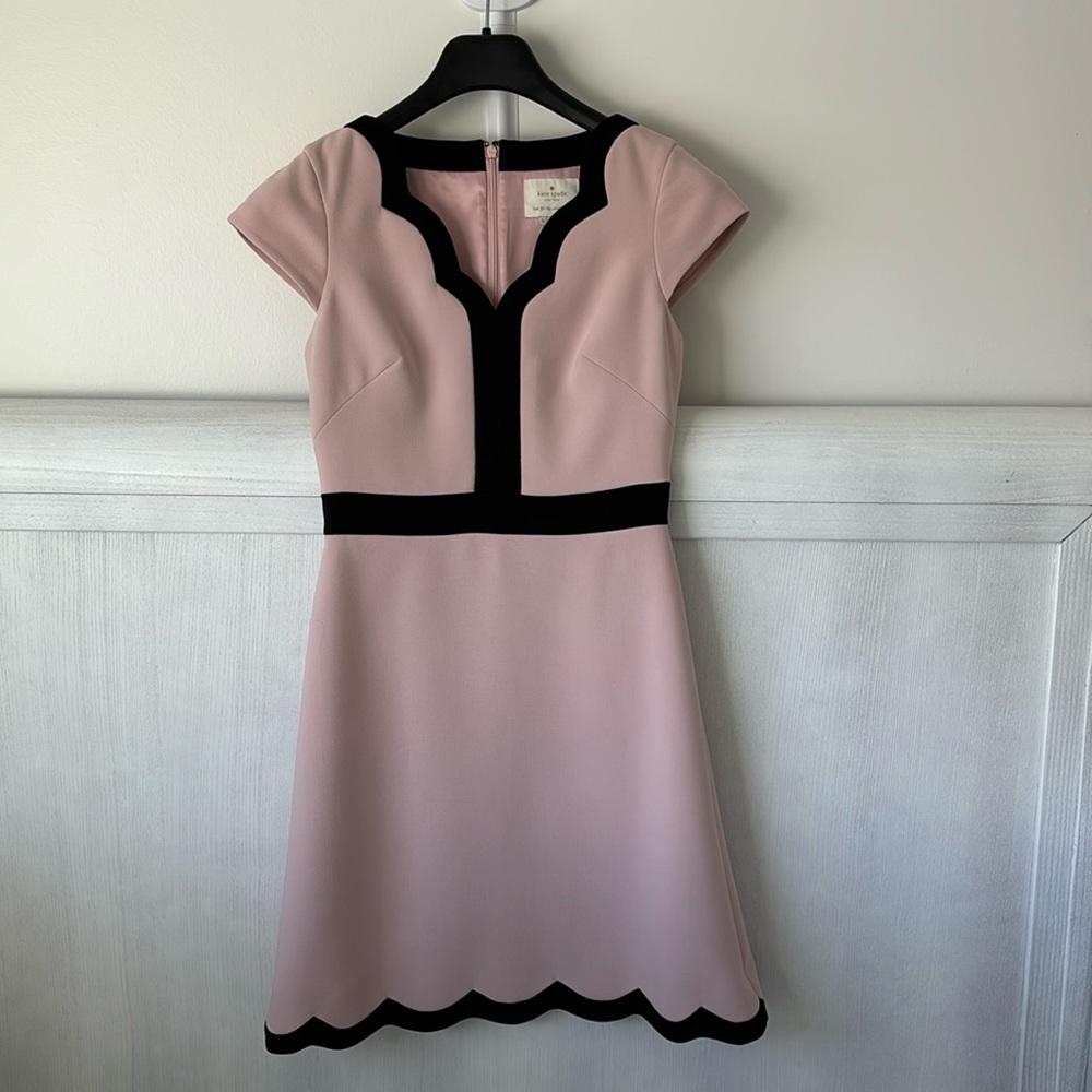 Brand new with tag Kate Spade dress in calm pink. Bossy barbie!